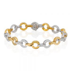 18 karat yellow and white gold circle style bracelet. To style with.