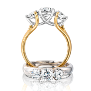 Two variations of a claw sweep 3 diamond engagement ring with 18k white and yellow gold