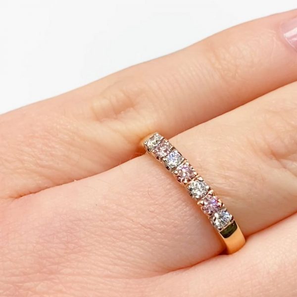 Brilliant cut 7 across white and pink diamond eternity ring