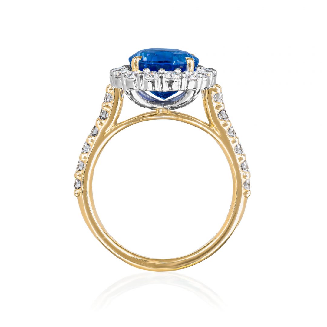 Oval cut sapphire with diamond halo ring - Holloway Diamonds