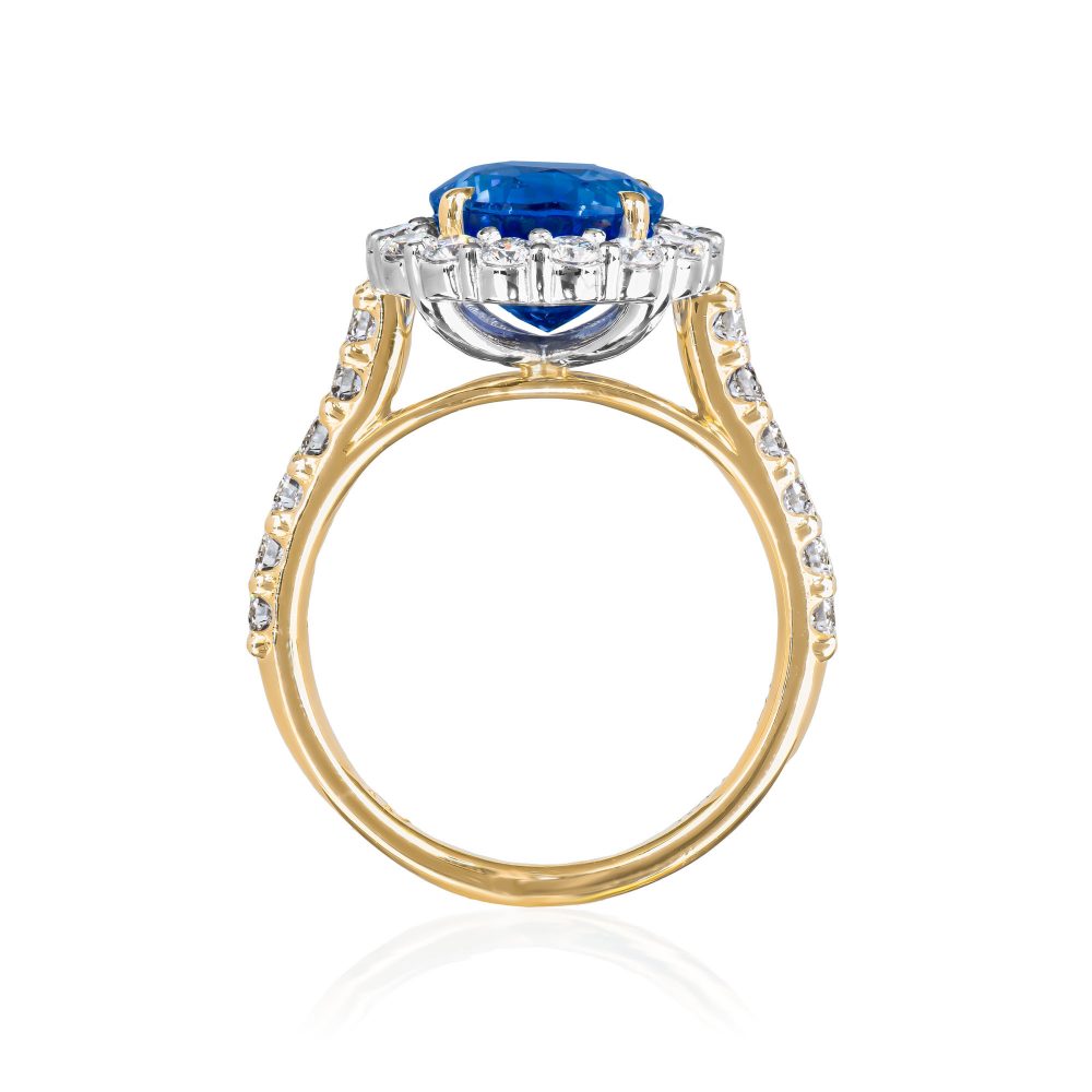 Oval cut sapphire with diamond halo ring - Holloway Diamonds