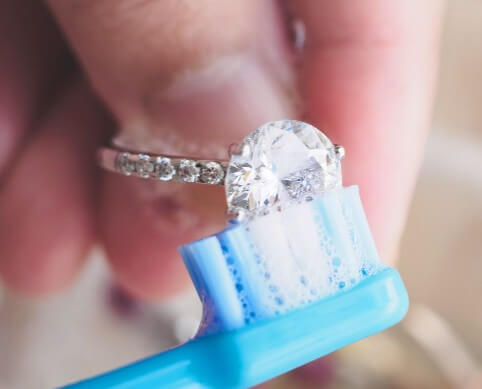 step 4- use soft toothbrush to clean dirt from your engagement ring